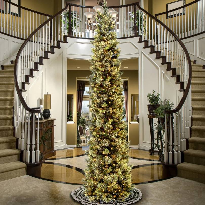 H4X043National Tree Company Pre-Lit Artificial Giant Slim Christmas Tree, Green, Carolina Pine, White Lights, Flocked with Pine Cones, Includes Stand, 12 feet